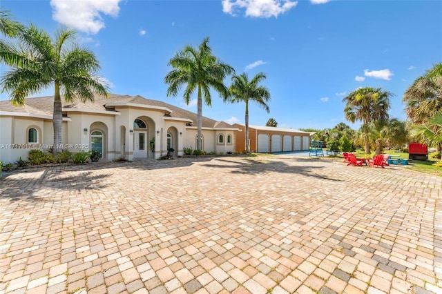 view of front of home with a garage