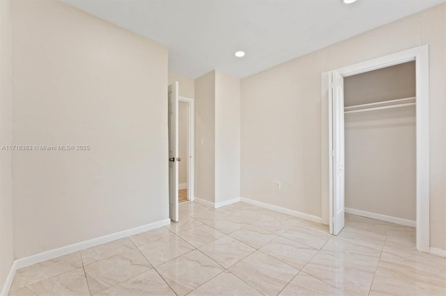 unfurnished bedroom featuring a closet