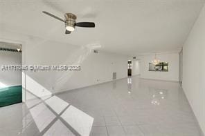 unfurnished room with ceiling fan