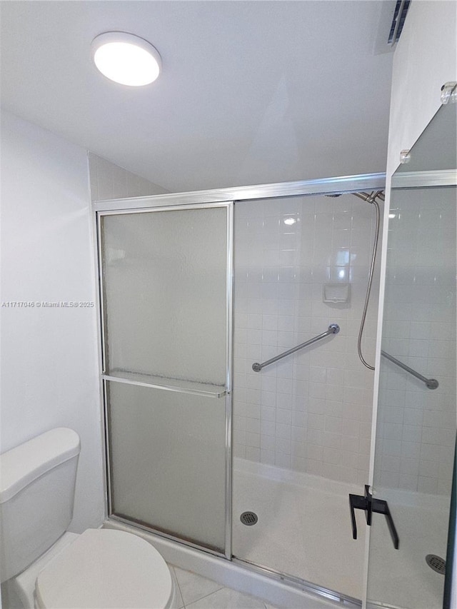 2606 NW 104th Ave Unit 202, Sunrise, FL 33322 - bathroom with toilet and a shower stall