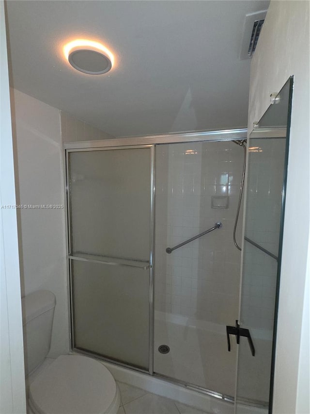 2606 NW 104th Ave Unit 202, Sunrise, FL 33322 - bathroom featuring a stall shower and tile patterned floors
