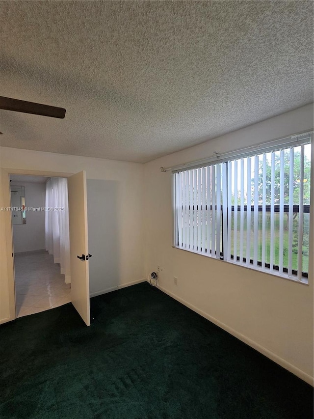2606 NW 104th Ave Unit 202, Sunrise, FL 33322 - carpeted empty room with healthy amount of natural light and a textured ceiling