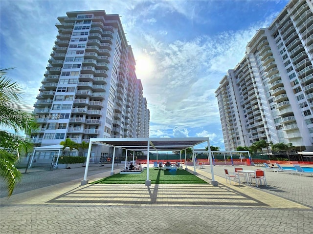 18051 Biscayne Blvd Unit 1204, Aventura, FL 33160 - view of apartment building / complex with a carport
