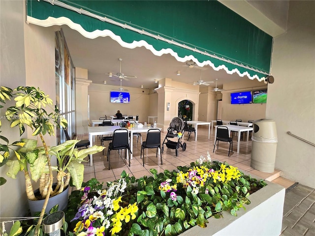18051 Biscayne Blvd Unit 1204, Aventura, FL 33160 - view of patio with ceiling fan and outdoor dining space