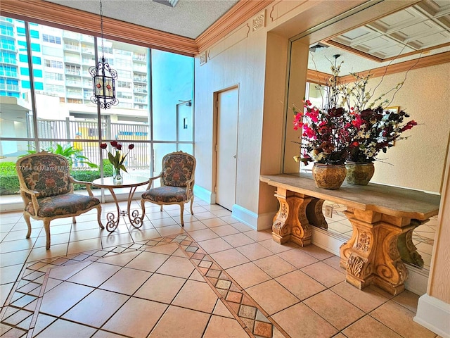 sunroom featuring a chandelier