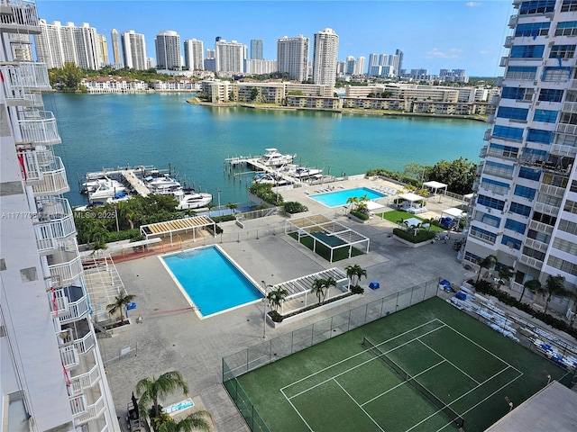 aerial view featuring a water view and a city view