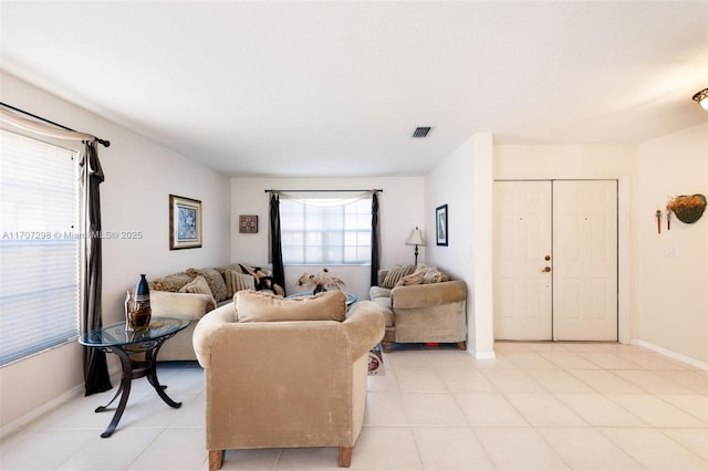 2355 NW 137th Ter, Sunrise, FL 33323 - living room with light tile patterned floors and baseboards