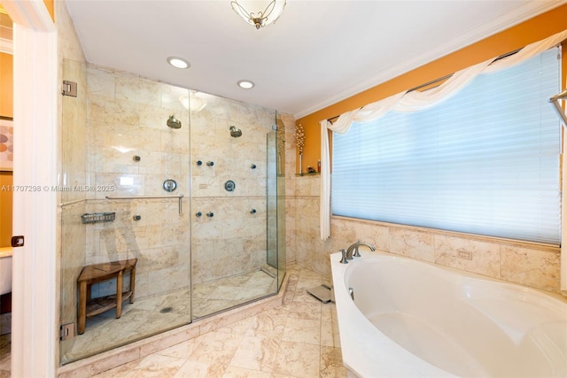 bathroom featuring crown molding, independent shower and bath, and tile walls