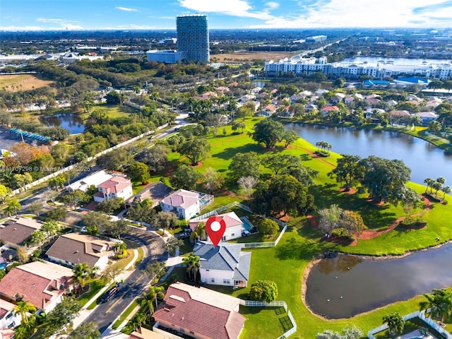 drone / aerial view with a water view