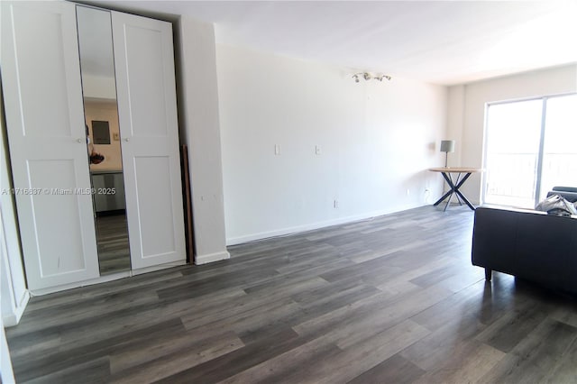 living room with dark wood-type flooring