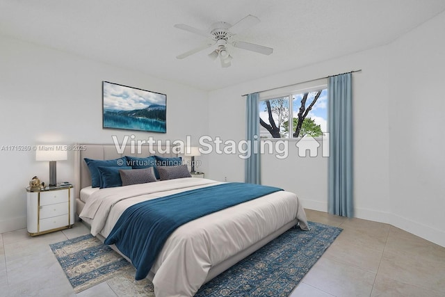 bedroom with ceiling fan and light tile patterned flooring