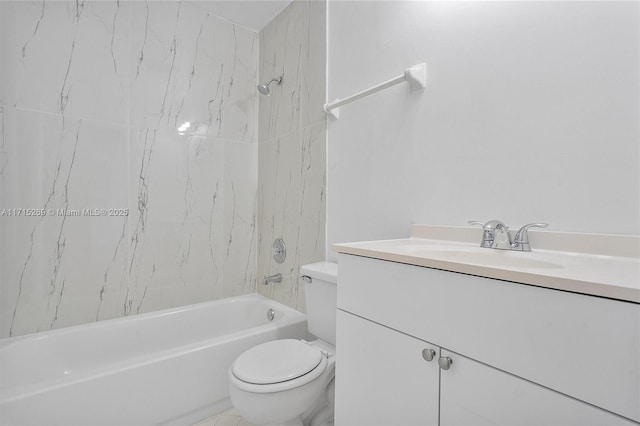 full bathroom featuring vanity, tiled shower / bath combo, and toilet