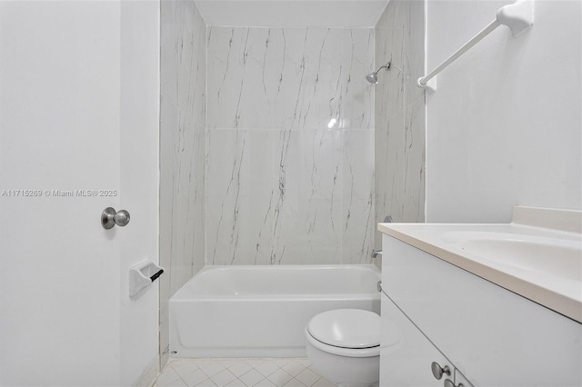 full bathroom with tile patterned flooring, vanity, toilet, and tiled shower / bath combo