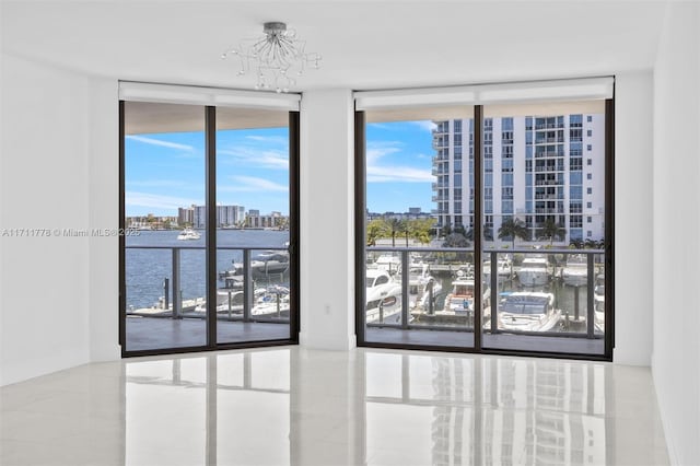 17301 Biscayne Blvd Unit 305, North Miami Beach, FL 33160 - detailed view of a view of city, a chandelier, and a large body of water