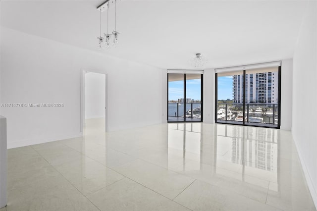17301 Biscayne Blvd Unit 305, North Miami Beach, FL 33160 - unfurnished room featuring floor to ceiling windows