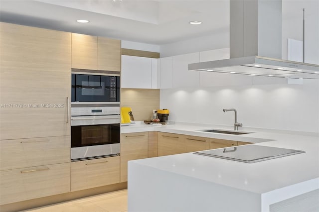 17301 Biscayne Blvd Unit 305, North Miami Beach, FL 33160 - kitchen with black appliances, wall chimney exhaust hood, light brown cabinets, a sink, and recessed lighting