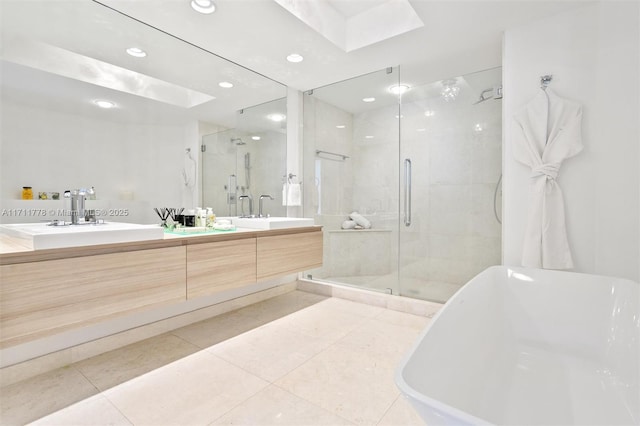 17301 Biscayne Blvd Unit 305, North Miami Beach, FL 33160 - full bath featuring double vanity, a shower stall, a freestanding tub, a skylight, and recessed lighting
