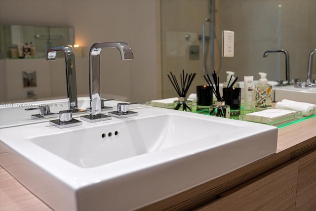 17301 Biscayne Blvd Unit 305, North Miami Beach, FL 33160 - bathroom featuring vanity and a shower with door