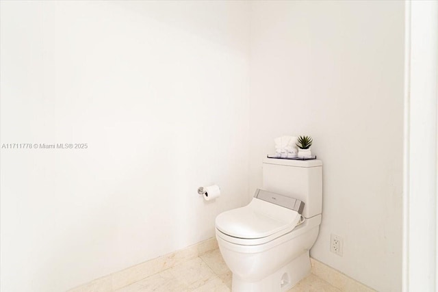 17301 Biscayne Blvd Unit 305, North Miami Beach, FL 33160 - bathroom featuring toilet and baseboards