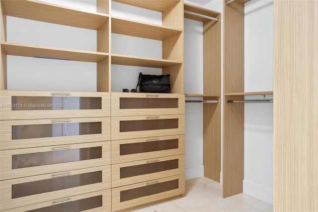 17301 Biscayne Blvd Unit 305, North Miami Beach, FL 33160 - walk in closet featuring tile patterned flooring