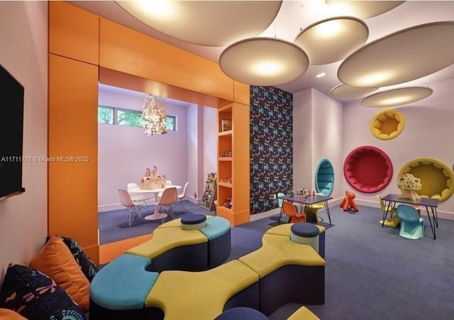 17301 Biscayne Blvd Unit 305, North Miami Beach, FL 33160 - playroom with carpet flooring and a chandelier