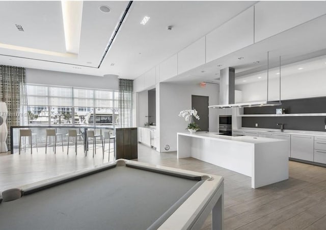 17301 Biscayne Blvd Unit 305, North Miami Beach, FL 33160 - recreation room with light wood-style floors, billiards, and a sink