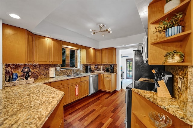 kitchen featuring dishwasher, sink, dark wood-type flooring, light stone counters, and black / electric stove