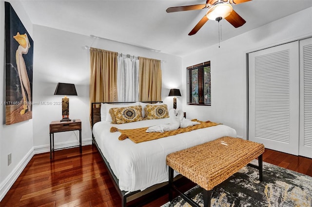 bedroom featuring a closet, ceiling fan, and dark wood-type flooring