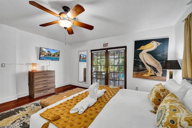 bedroom featuring ceiling fan, access to exterior, wood-type flooring, and french doors