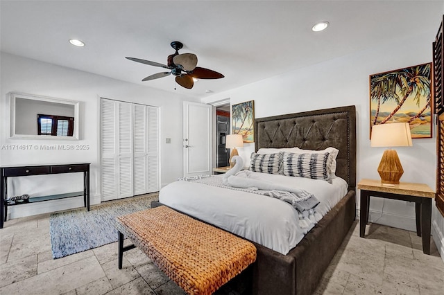 bedroom with ceiling fan and a closet