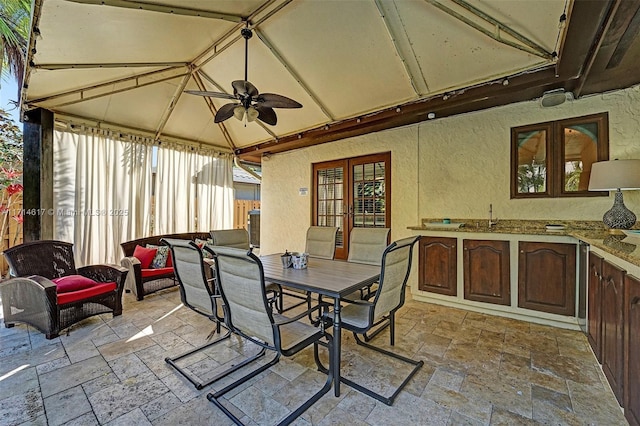 view of patio / terrace with french doors and ceiling fan