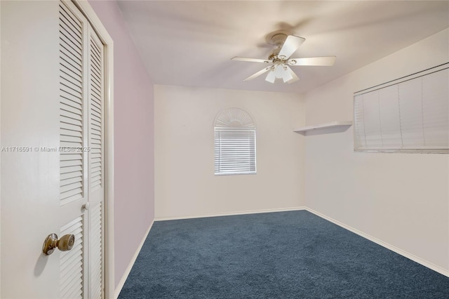 interior space featuring ceiling fan, a closet, and carpet