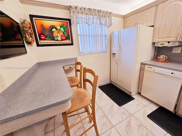 kitchen with white appliances and light tile patterned floors