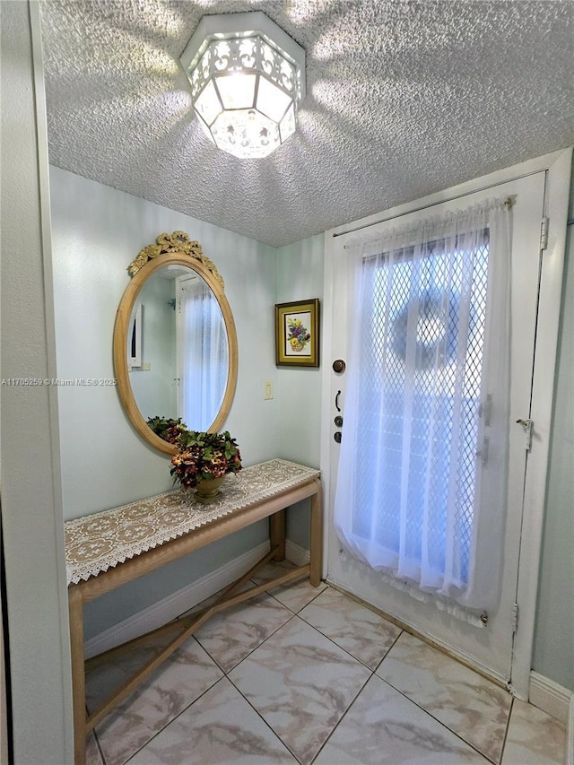 bathroom featuring a textured ceiling