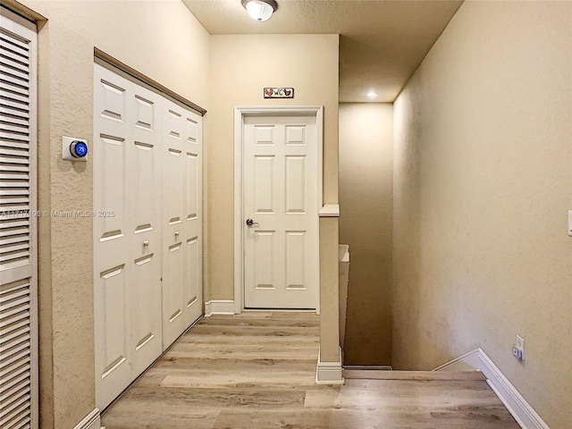 doorway to outside featuring light hardwood / wood-style floors