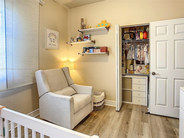 living area featuring light hardwood / wood-style floors