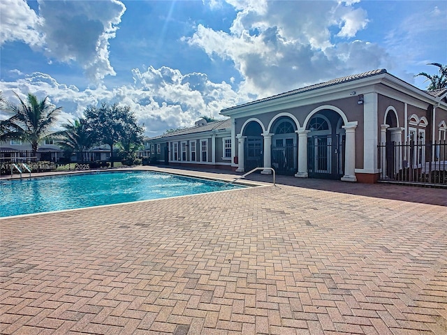 view of swimming pool featuring a patio