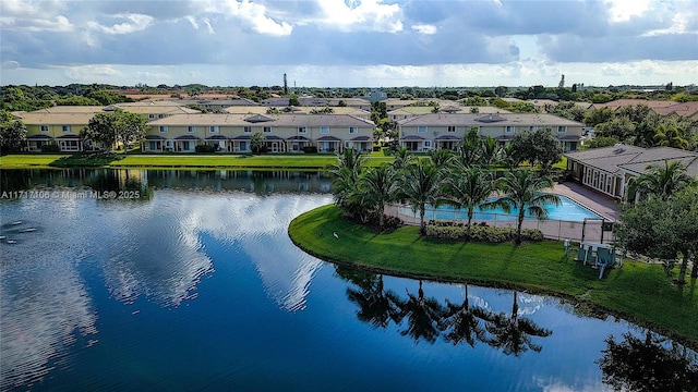 drone / aerial view with a water view