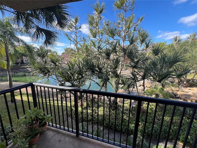 balcony featuring a water view