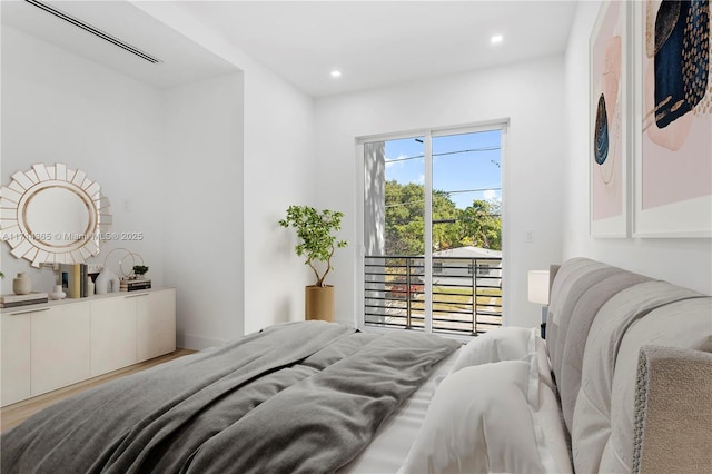 bedroom featuring hardwood / wood-style floors