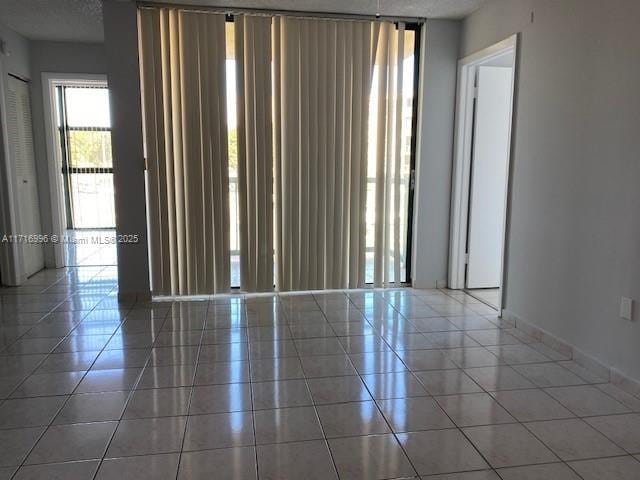 2055 SW 122nd Ave Unit 205, Miami, FL 33175 - unfurnished room featuring tile patterned flooring