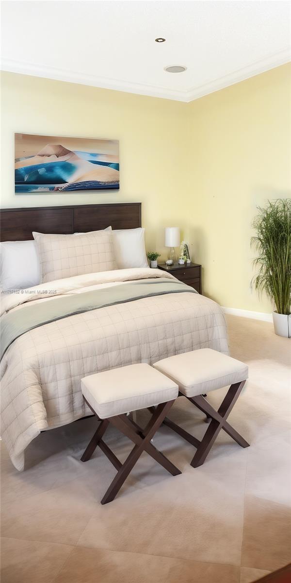 bedroom featuring crown molding