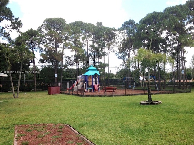 view of jungle gym with a yard