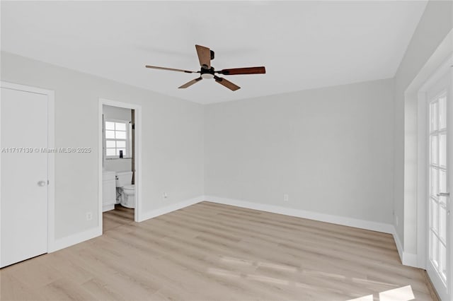 unfurnished bedroom featuring connected bathroom, ceiling fan, a closet, and light hardwood / wood-style floors