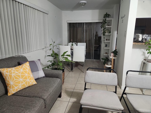 living room with light tile patterned floors