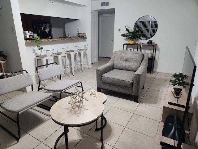 living room with light tile patterned floors