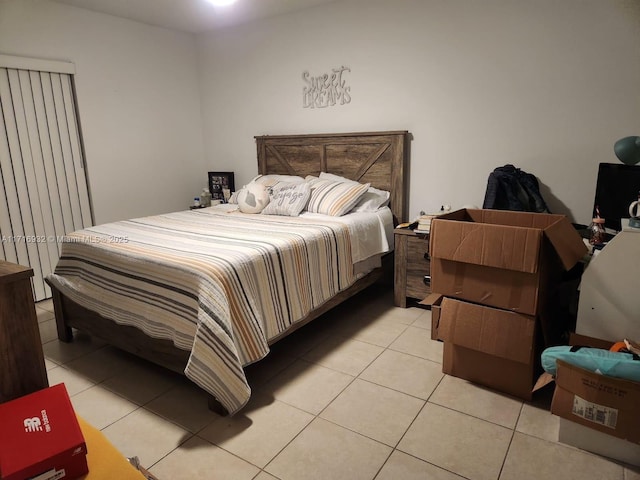 bedroom with light tile patterned flooring