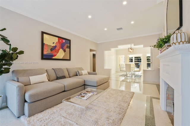 living area featuring visible vents, recessed lighting, a fireplace with flush hearth, and crown molding