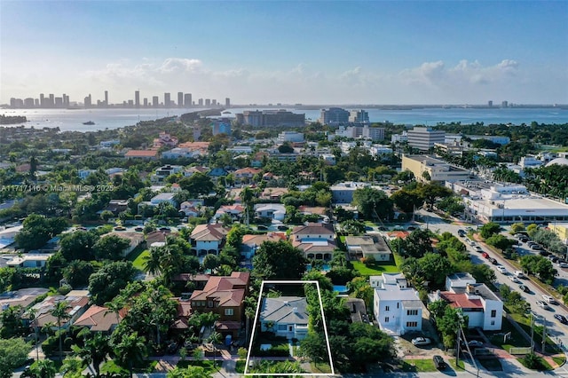 aerial view featuring a view of city and a water view