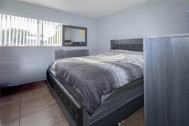 bedroom featuring tile patterned floors